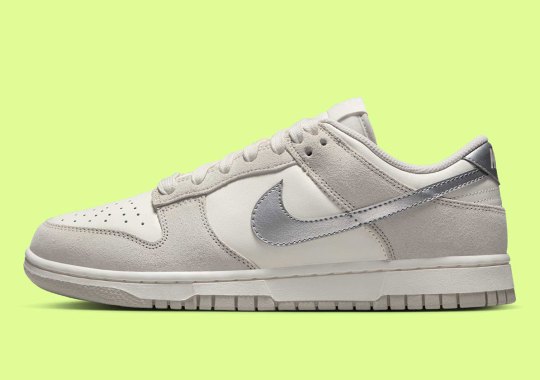 A Silver Swoosh Adds Spark To A Greyed Out Nike Dunk